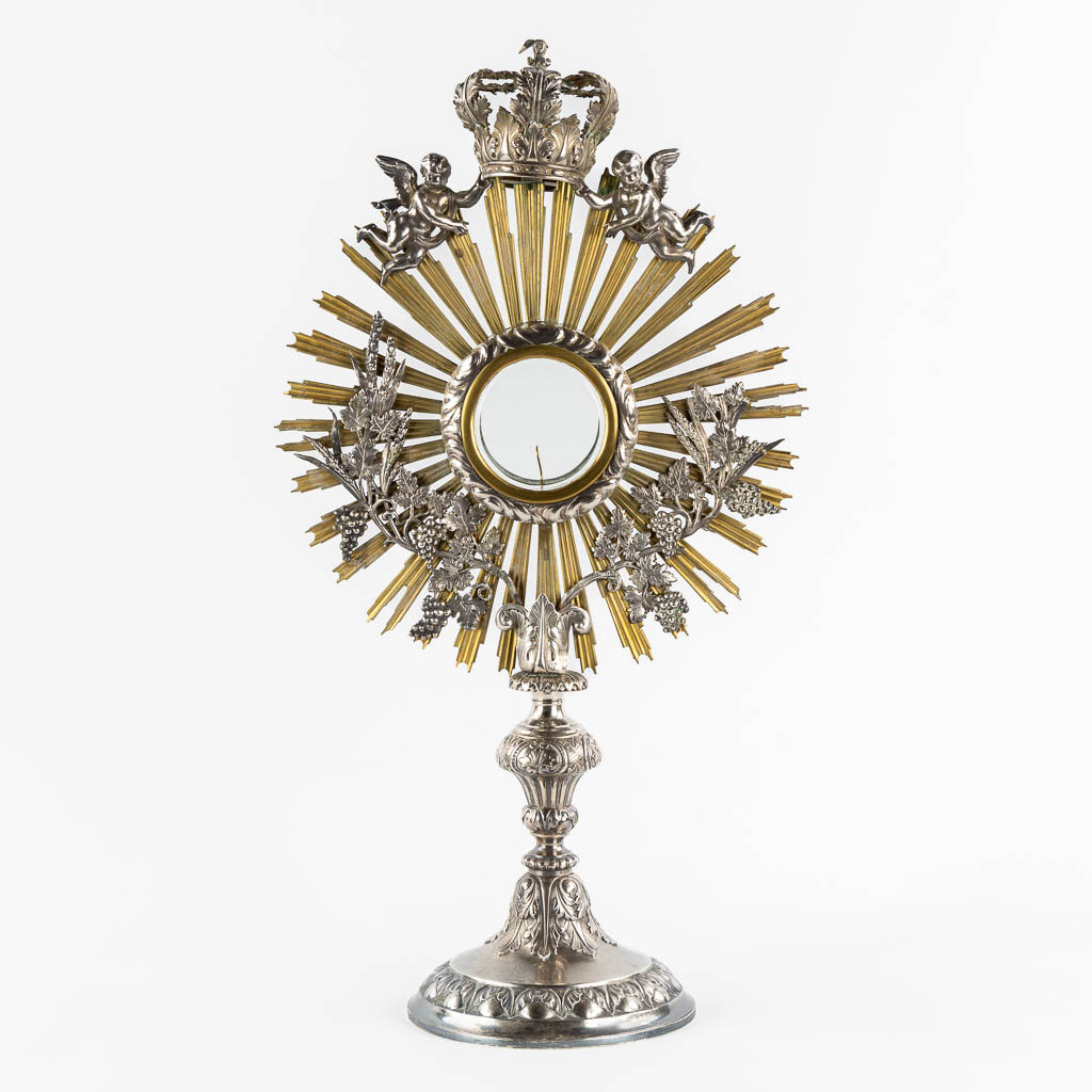 A sunburst monstrance, silver and brass, Henricus De Curte, Ghent, circa 1868. (W:30 x H:55 cm)