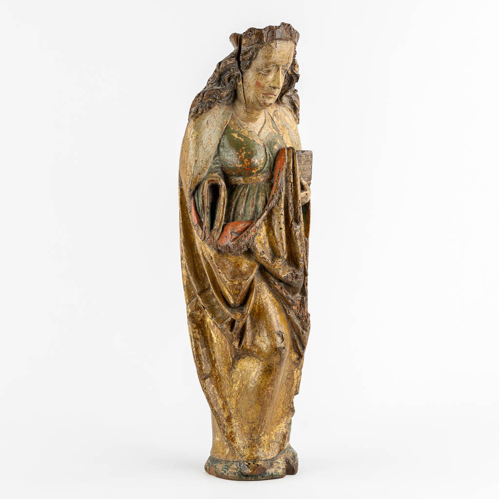 Saint Ursula, princess of Bretagne, a wood sculpture, Rhineland, Late 14th C. (L:13 x W:17 x H:58 cm)