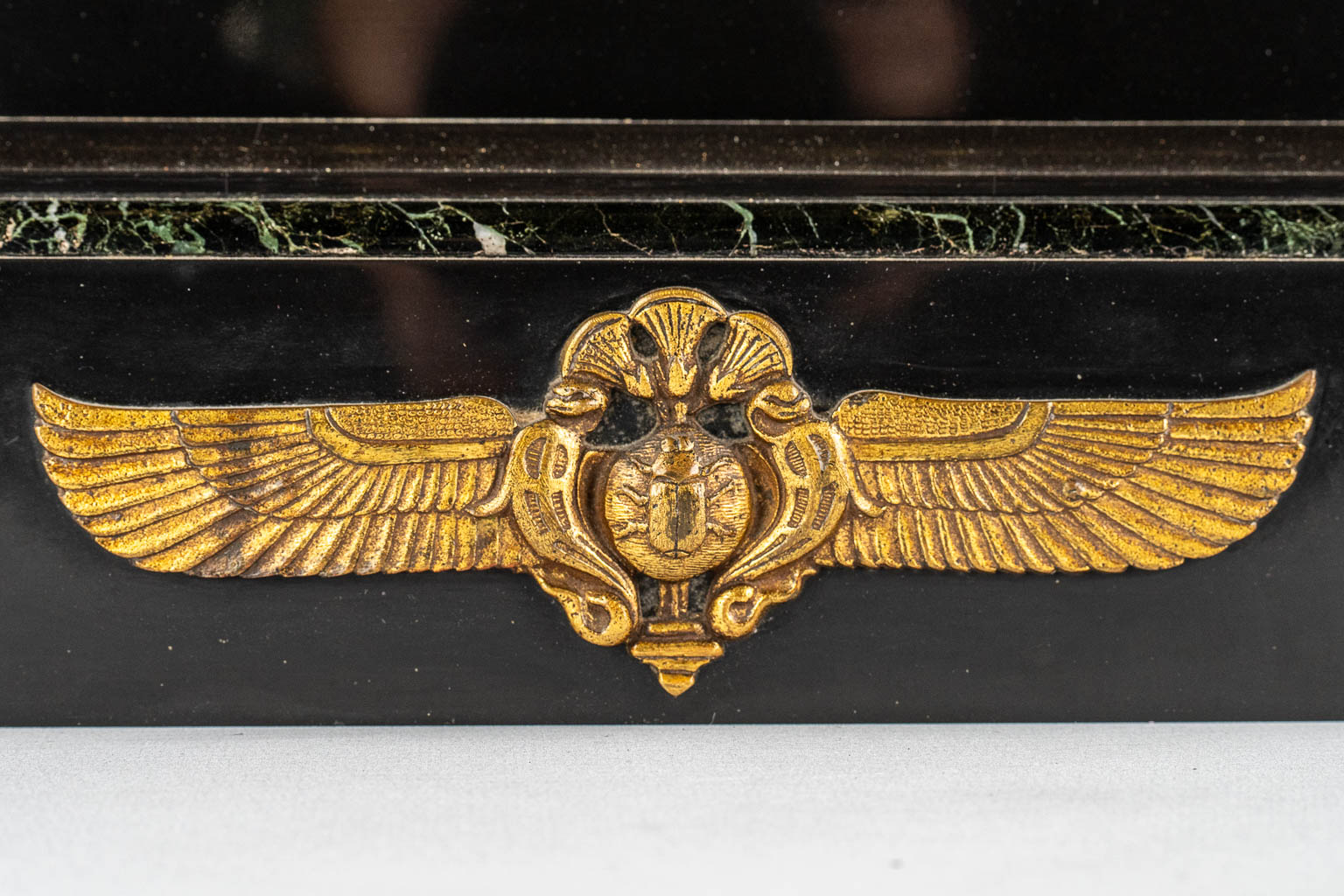 A Neoclassical three-piece mantle garniture clock and side pieces, marble and bronze. 19th C.