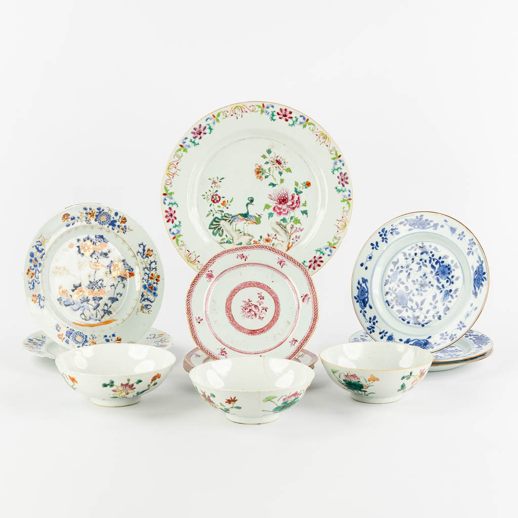 Twelve Chinese Famille Rose and Blue-white plates and bowls. 19th/20th C. (D:29 cm)