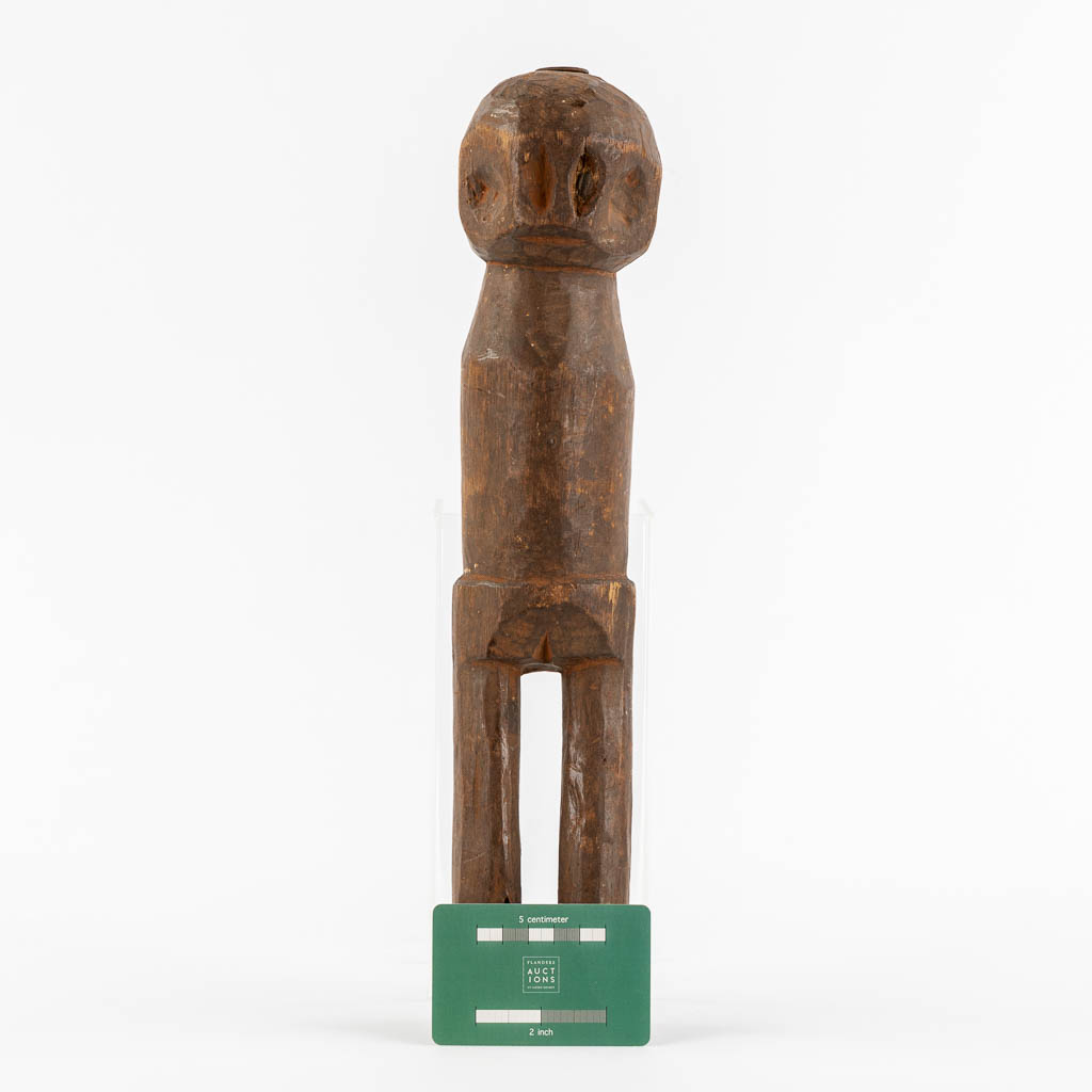 A Manioc Press, and a sculpture, Africa, 20th C.
