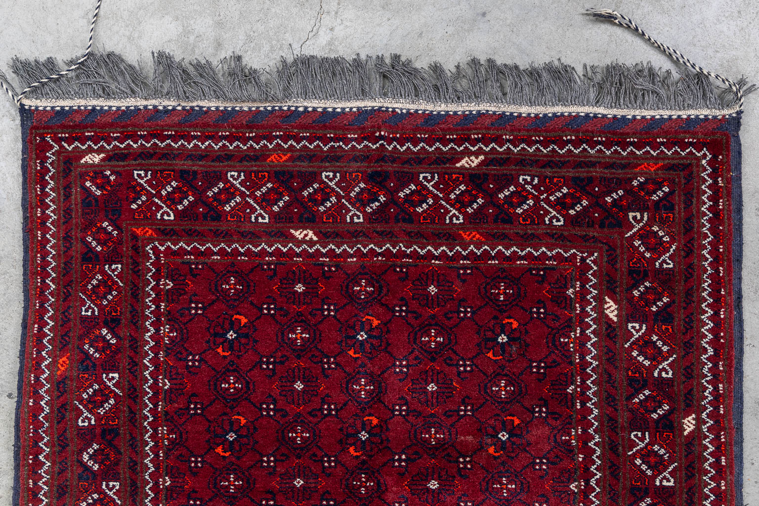 An Oriental hand-made runner, Afghan. (L:391 x W:85 cm)