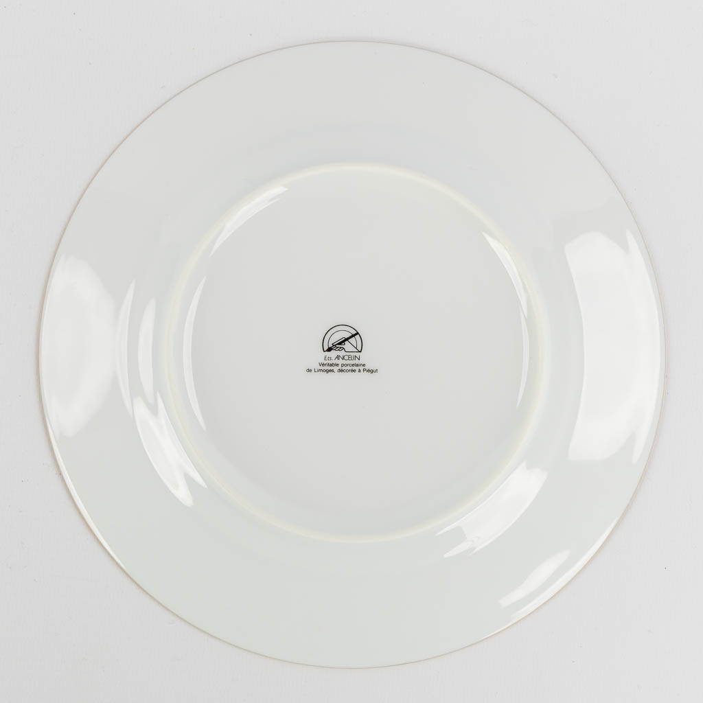 Limoges, a collection of fish-, cheese- and dinner plates. Porcelain. (L:31 x W:39 cm)