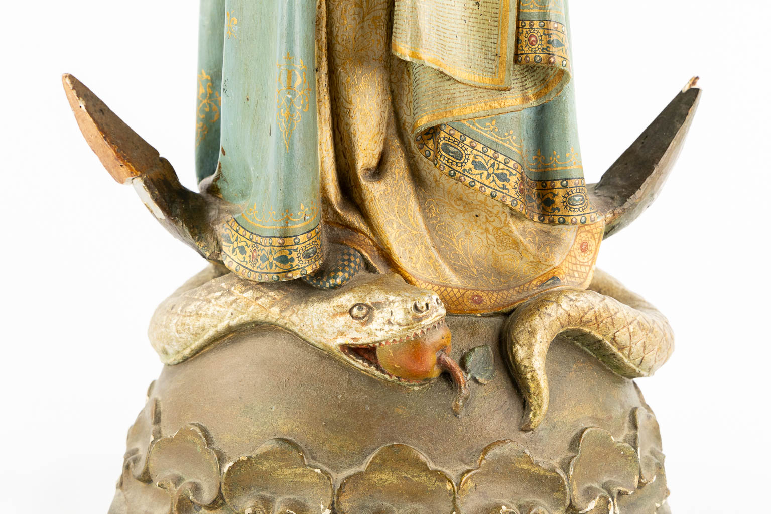 A Gothic Revival Virgin Mary on Crescent moon trampling the serpent, Polychrome plaster. Circa 1900. (H:81 cm)