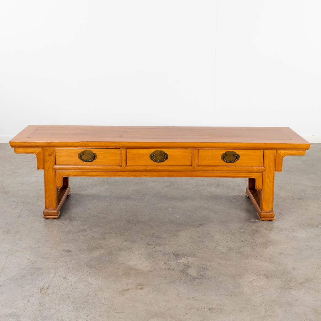 A Chinese low coffee table with 3 drawers. (L: 44 x W: 162 x H: 45 cm)