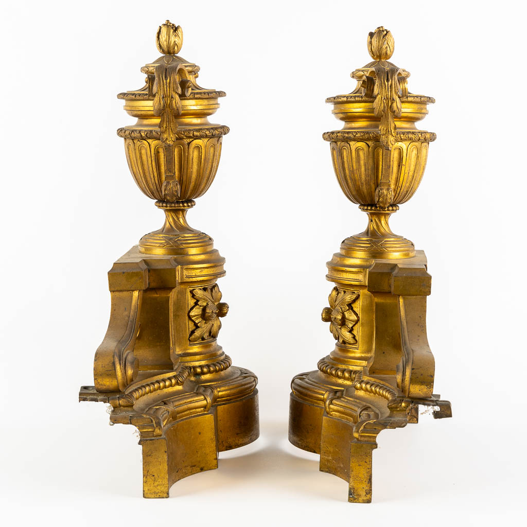 A fine pair of gilt bronze fireplace bucks, Louis XVI style. 19th C.