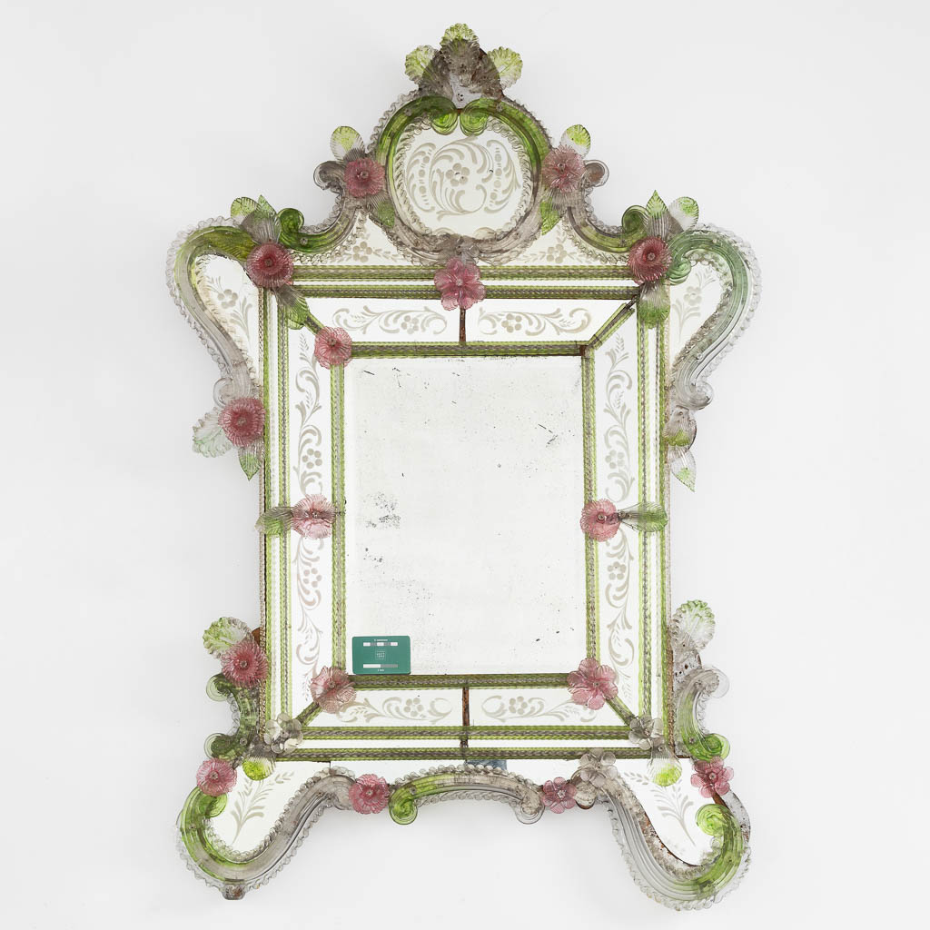 A Venetian glass mirror, Etched and coloured glass. Murano, Italy. (W:87 x H:126 cm)