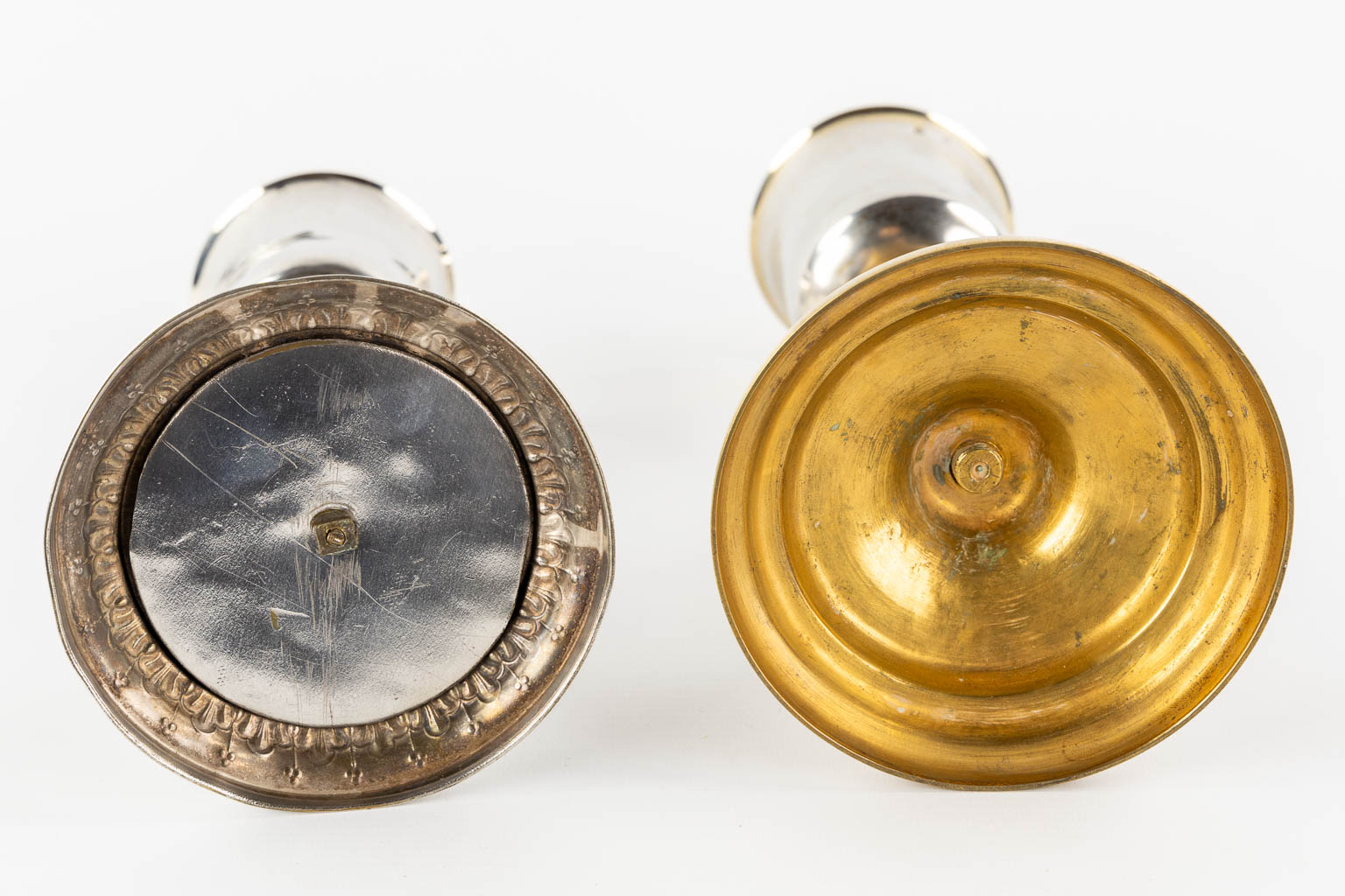 Two chalices with a silver cuppa, on a silver-plated and copper base.