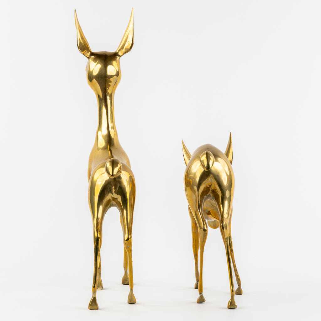 A pair of brass deer, Hollywood Regency style. (W:56 x H:33 cm)