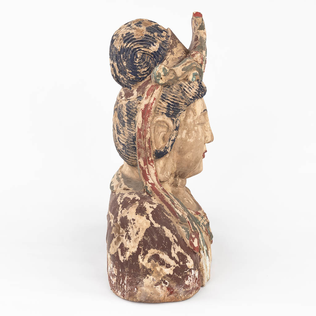 A large and antique wood sculptured buste of Guanyin. (L:28 x W:50 x H:69 cm)