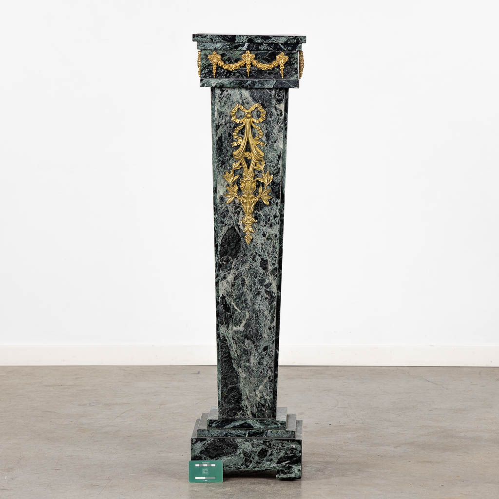 A green marble pedestal, mounted with bronze. (L:28 x W:28 x H:112 cm)