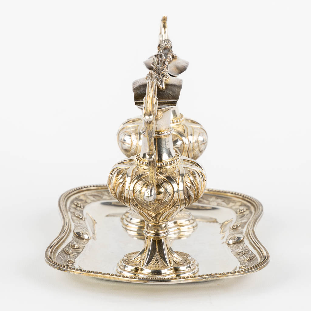 Joseph Dejean, Paris, a pair of wine and water cruets, silver, 1846-1865. 650g. (L:15 x W:26 x H:15 cm)