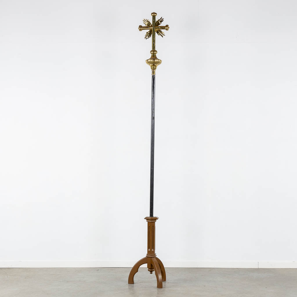 Four Processional crucifixes with their stands. Silver-plated metal and Brass. (H:265 cm)