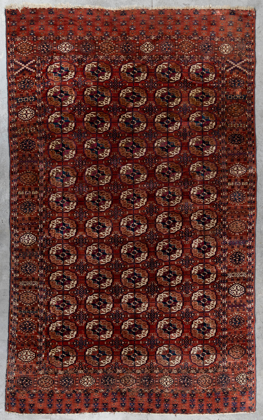 An Oriental hand-made carpet, Turkaman/Turkoman. (L:320 x W:201 cm)