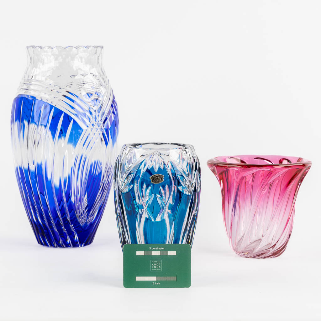 Val Saint Lambert, three coloured crystal vases. (H:29,5 x D:13,5 cm)