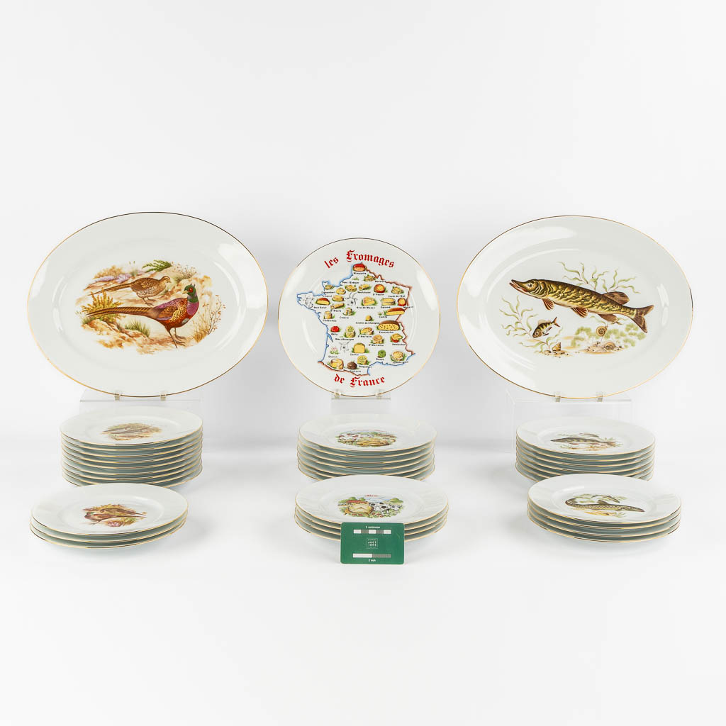 Limoges, a collection of fish-, cheese- and dinner plates. Porcelain. (L:31 x W:39 cm)