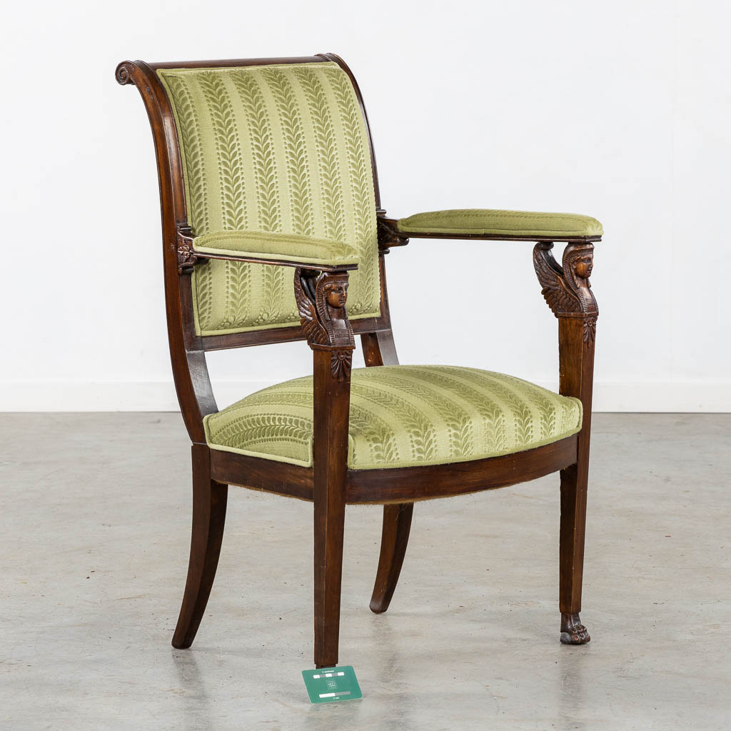 An antique armchair, sculptured wood in Empire style. (L:60 x W:59 x H:91 cm)