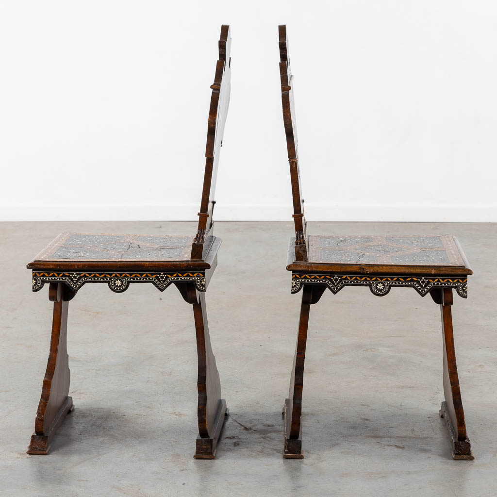 A Syrian table with two matching chairs, Marquetry and copper inlay, 19th C. (L:87 x W:121 x H:80 cm)