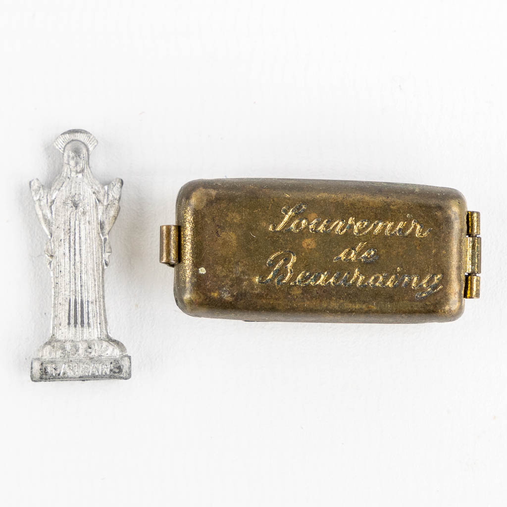 A collection of relics and religiosa, Paaschnagel, sealed paper relics and Agnus Dei. 