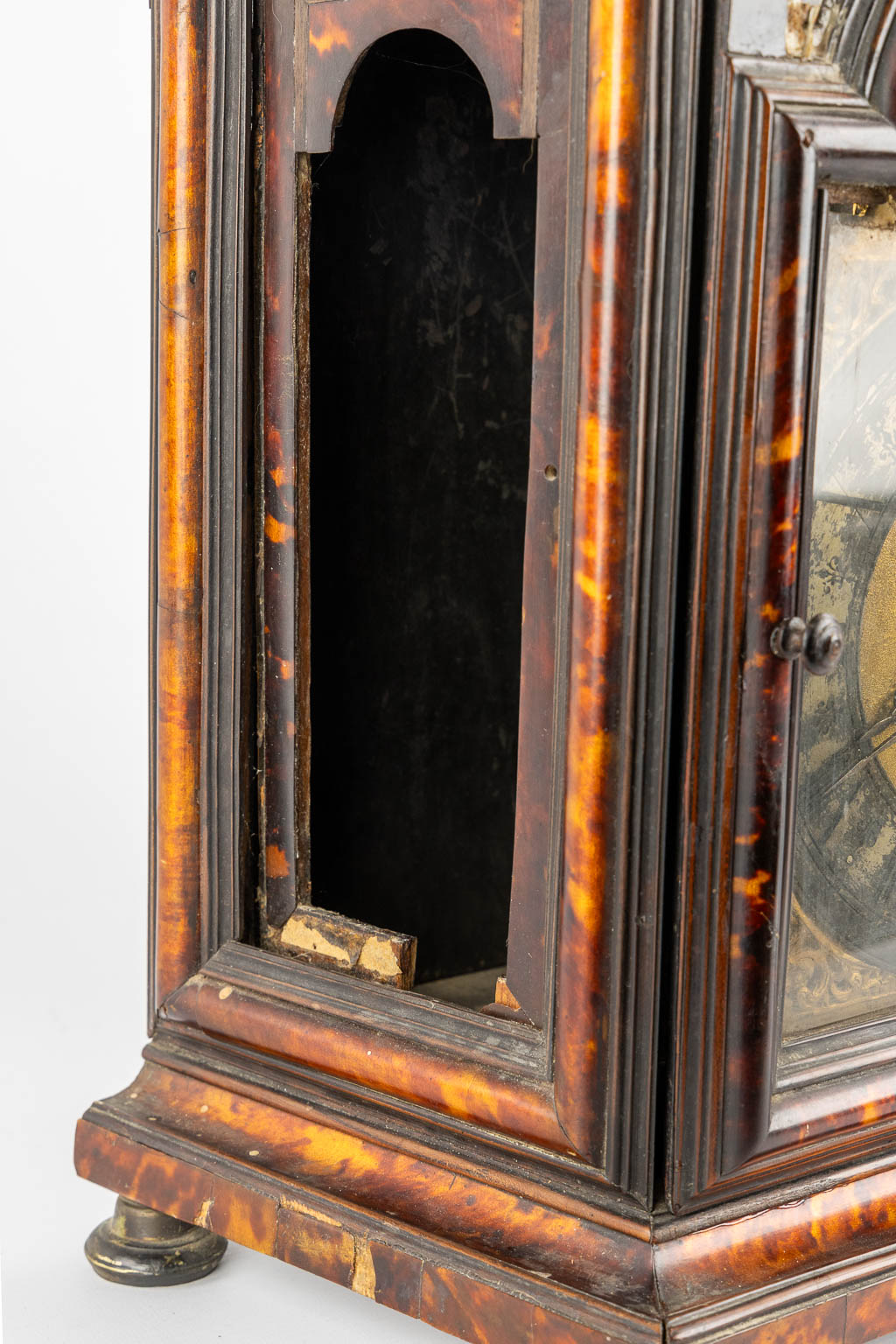 An antique Sicilian mantle clock, mounted with tortoiseshell and gilt bronze. Italy, 18th C. (L:20 x W:36 x H:53 cm)