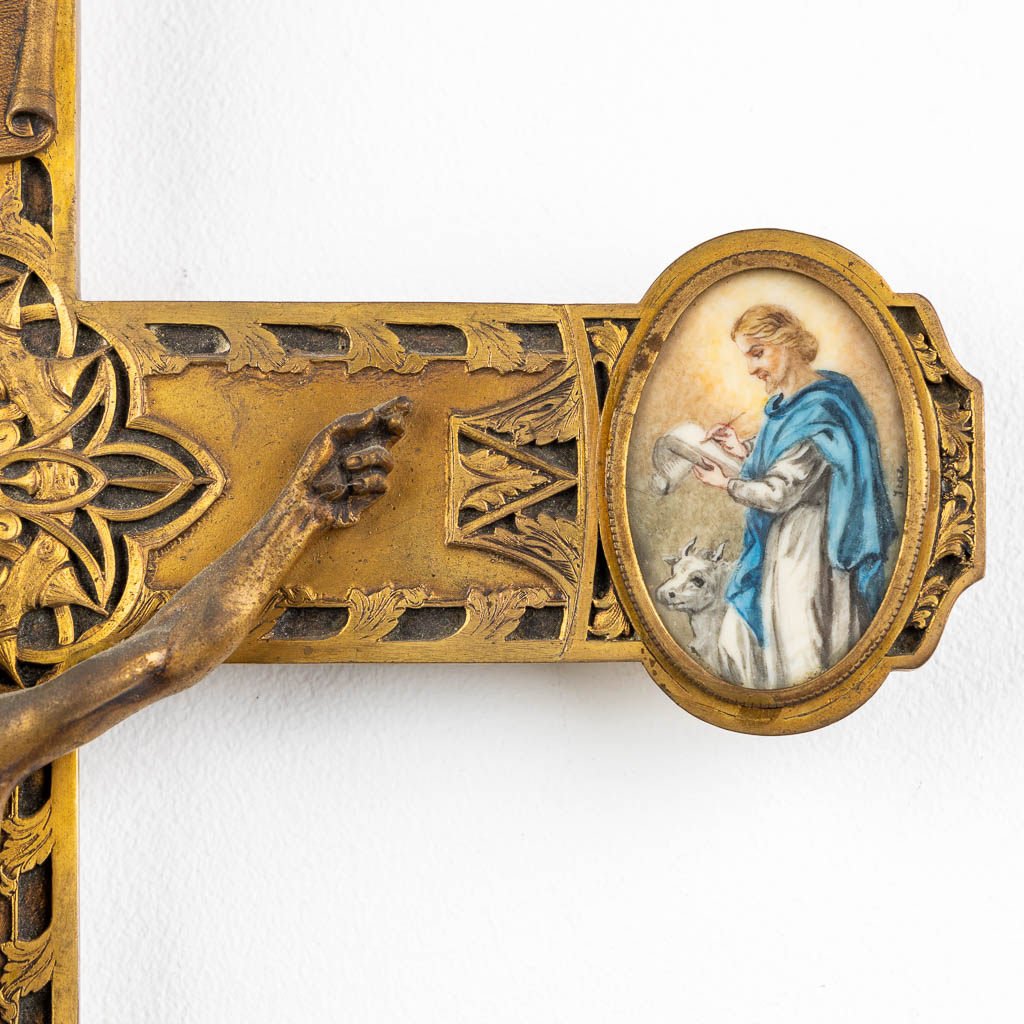 A crucifix, finely chiselled brass with 4 miniature paintings of 'The Four Evanglists'. 