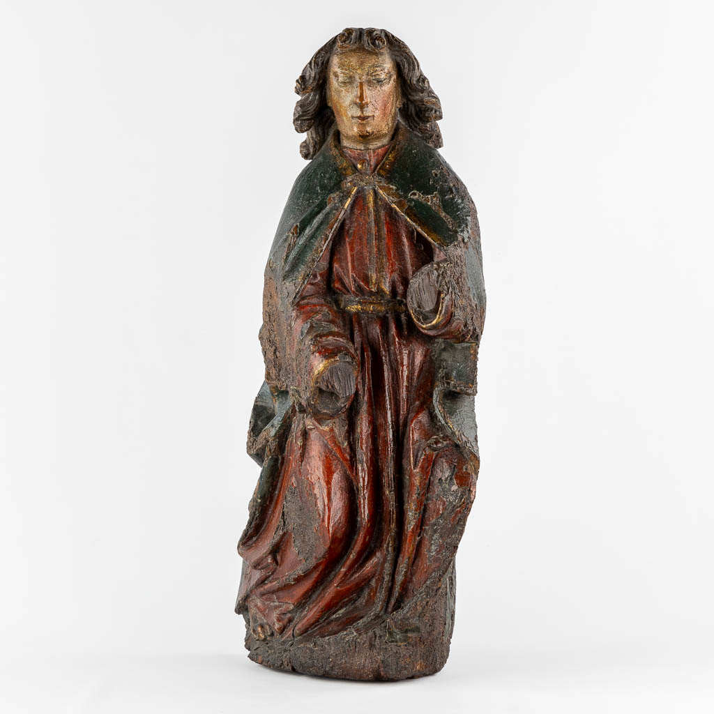 A large Gothic wood sculpture of an Angel, Rhineland, Germany, 14th/15th C.  (L:20 x W:36 x H:71 cm)