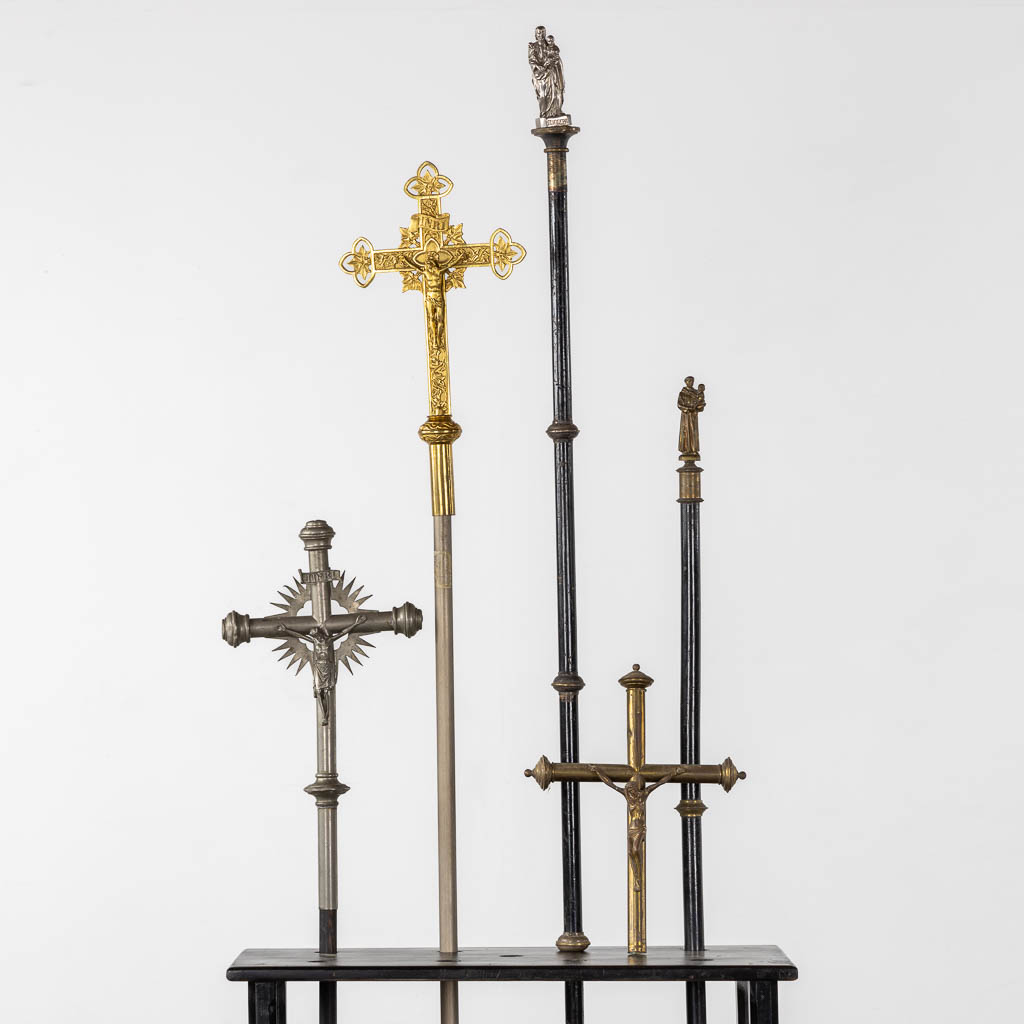 Three Processional crucifixes and two Processional staffs, Bronze and brass. Gothic Revival. (H:172 cm)