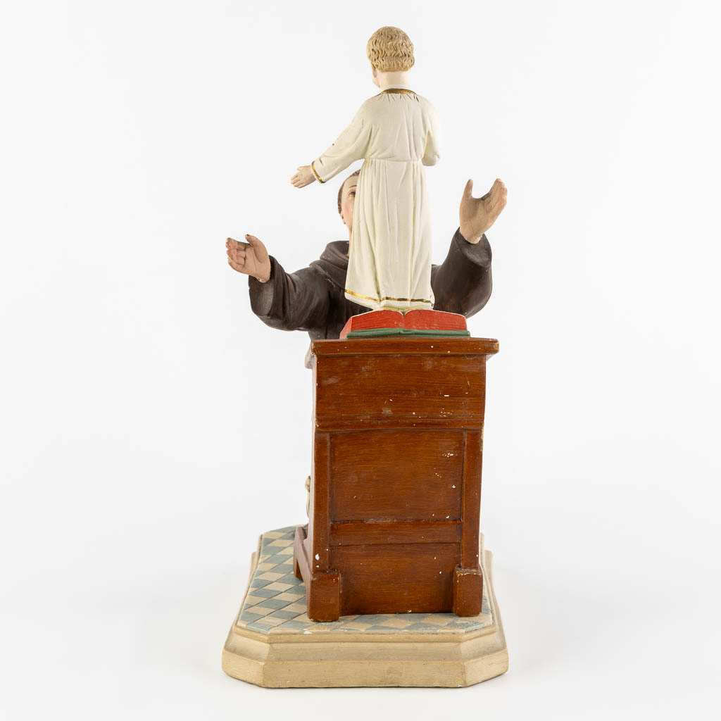 Saint Anthony with a child, polychrome plaster. Circa 1900. (L:20 x W:32 x H:44 cm)