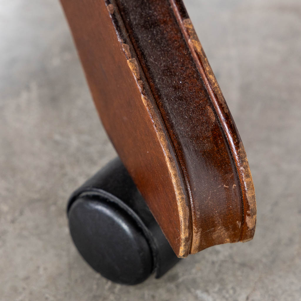 A Chesterfield style office chair, leather on a wood base. (L:70 x W:80 x H:115 cm)