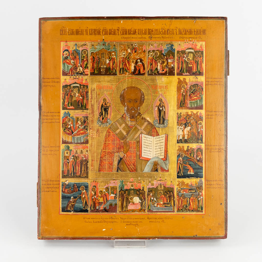 An Eastern European Icon 'The Life of Saint Nicholas', hand-painted decor. (W:30,5 x H:36 cm)