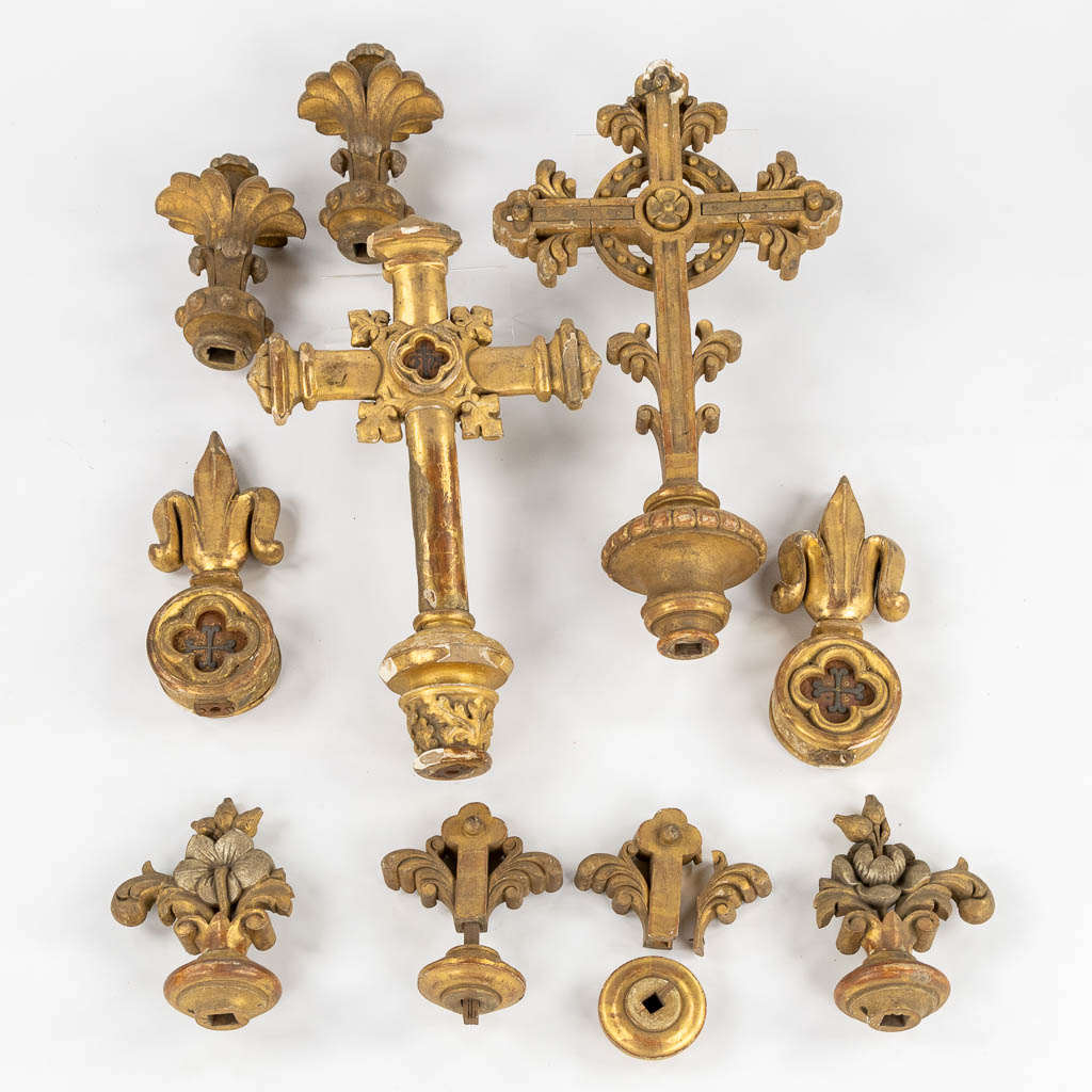 A set of antique wood-sculptured and patinated crucifixes and finials, thick silver-thread embroideries. 19th C. (W:37 x H:69 cm