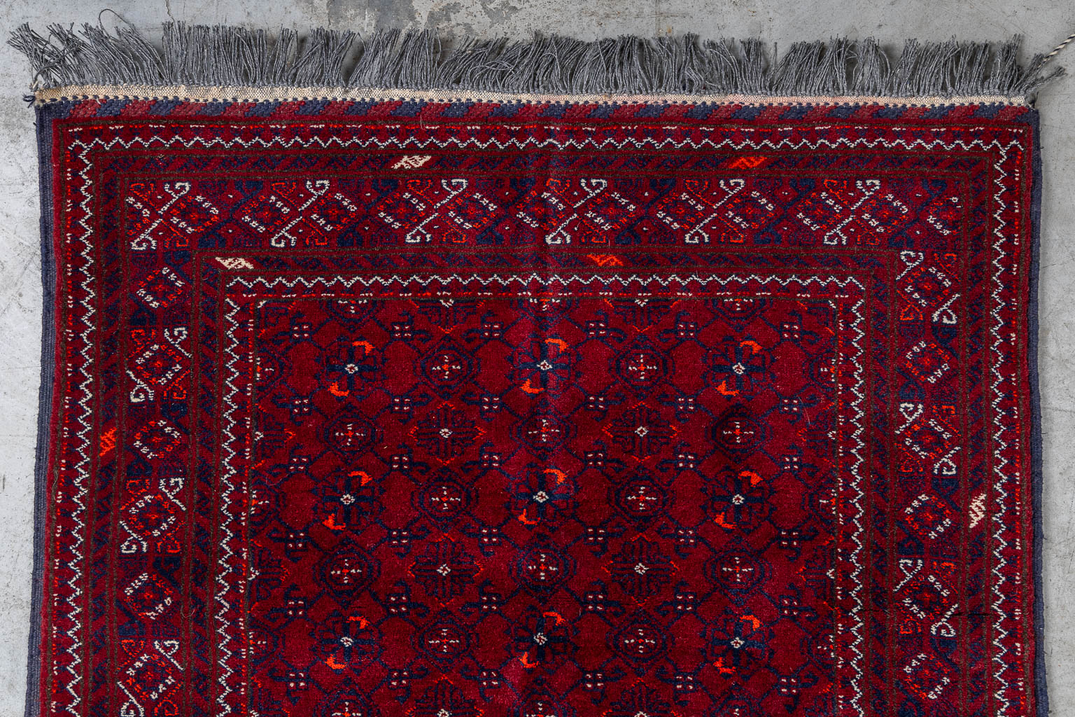 An Oriental hand-made runner, Afghan. (L:391 x W:85 cm)