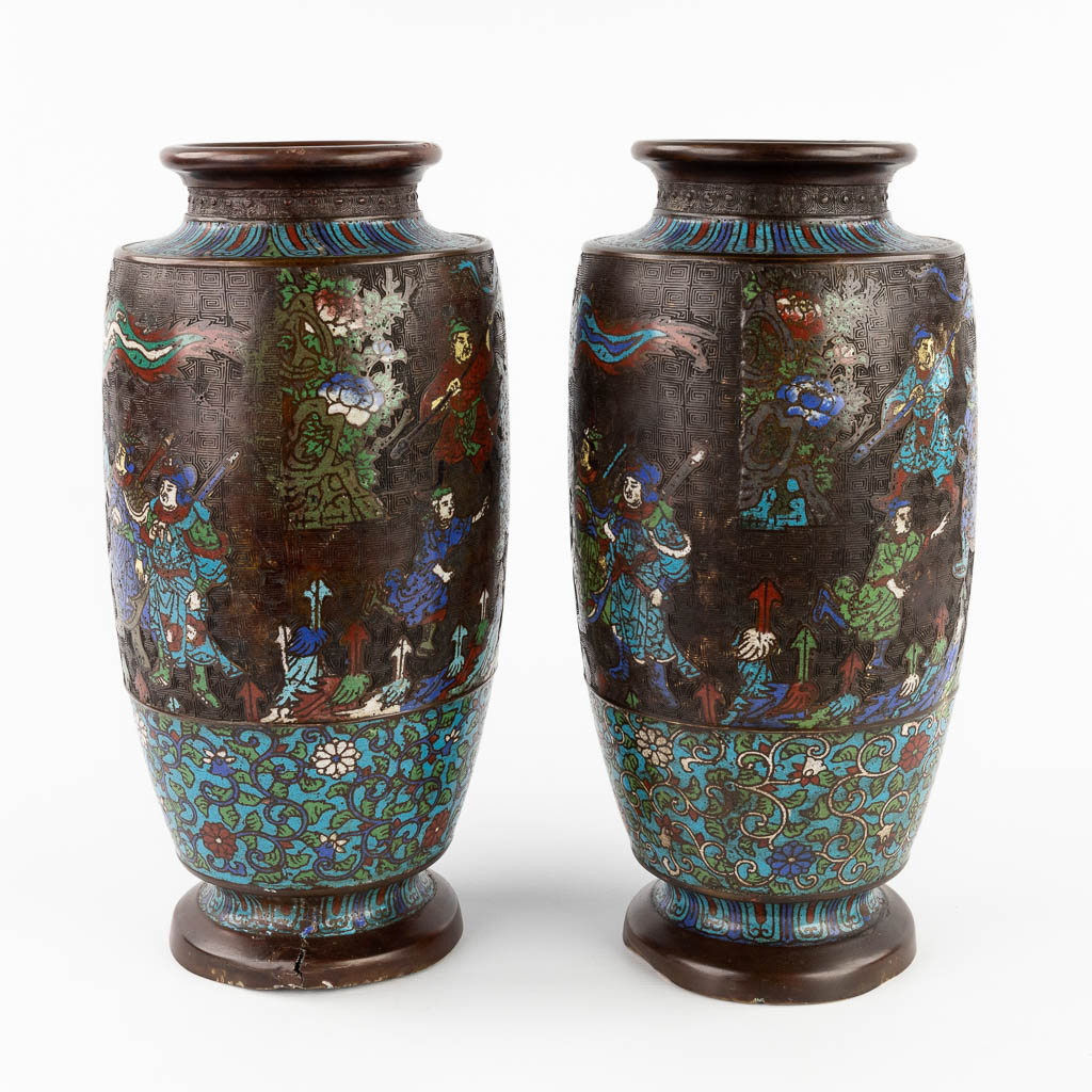 A pair of bronze vases with Champslevé decor. 19th C. (H:40 x D:20 cm)