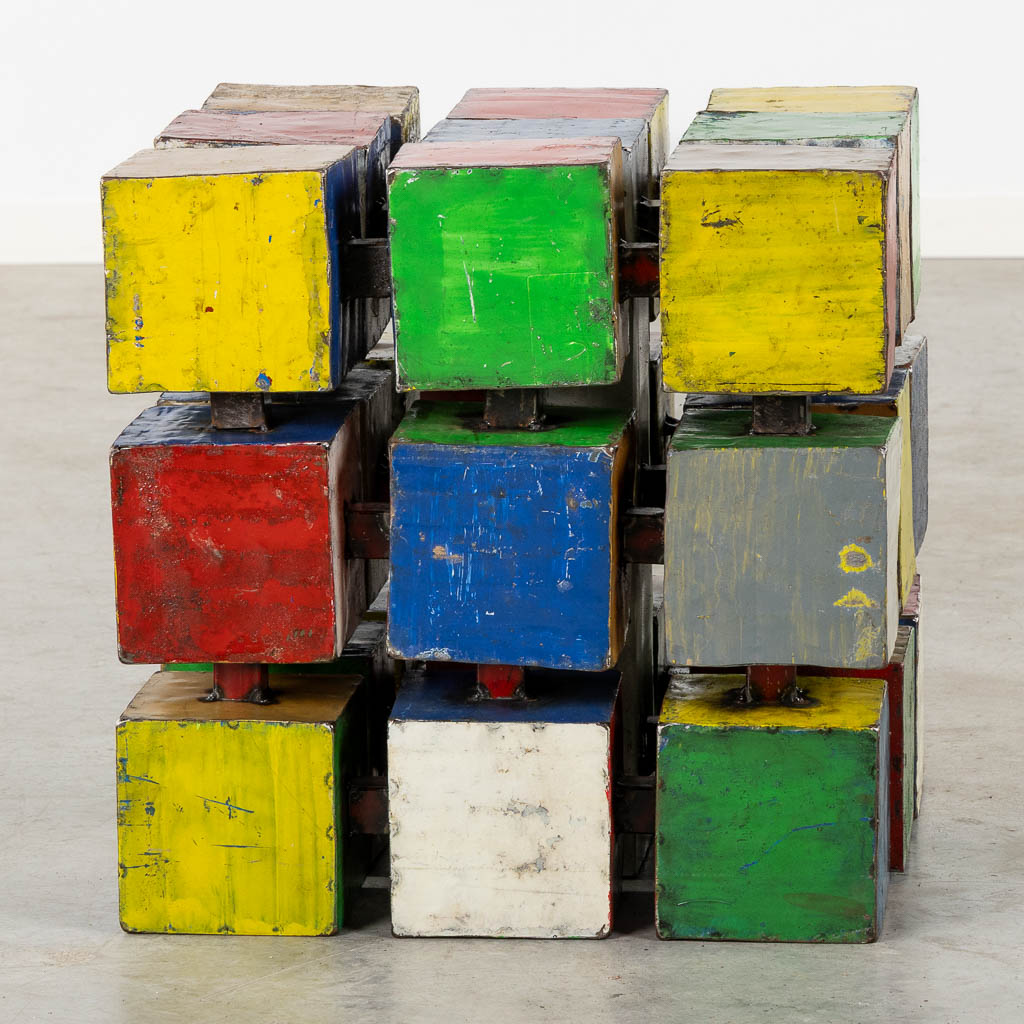 A mid-century side table in the shape of a Rubik's Cube 