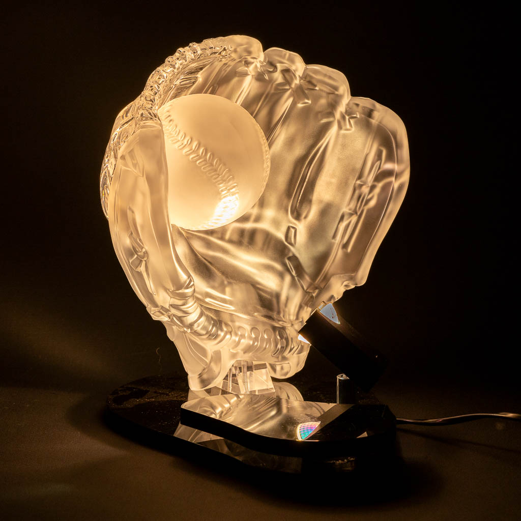 Christalleries Royales De Champagne. A baseball glove table lamp, Glass. (L:25 x H:28 cm)