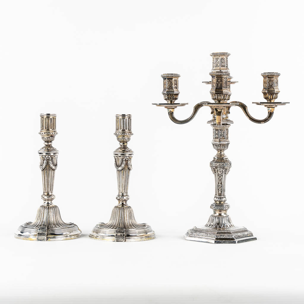 Christofle 'Duperier' a large candelabra, added are a pair of Candlesticks in Louis XVI style.