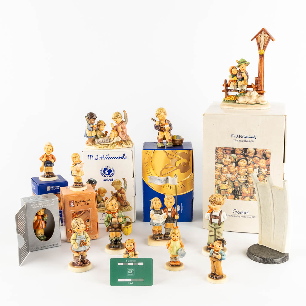 Hummel, 14 figurines, some with original boxes. (H:19 cm)