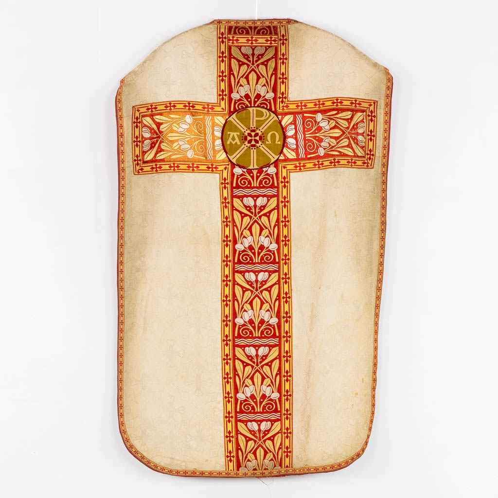 A cope, Humeral veil and Roman Chasuble, embroideries with images of fish and bread, The Holy Spirit. 