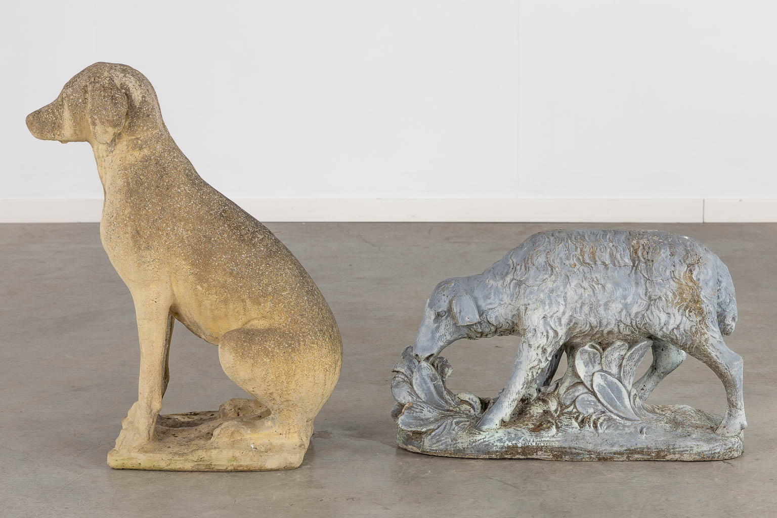 Two decorative garden statues of a dog and a sheep, concrete. (L:55 x W:28 x H:72 cm)