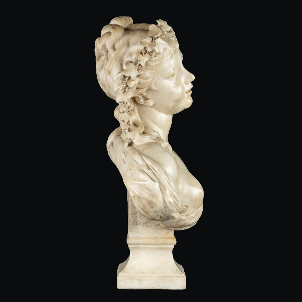 An elegant bust of a half-naked lady, sculptured marble. 19th C. (L:26 x W:45 x H:64 cm)