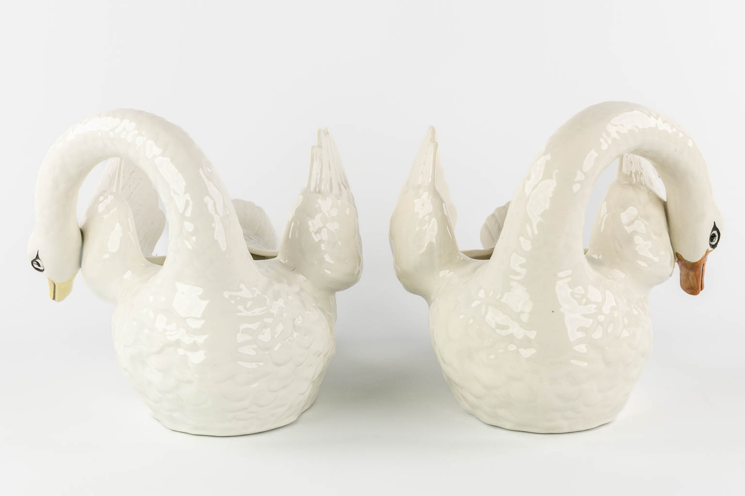 Nimy, a pair of figurative cache-pots, Swans.