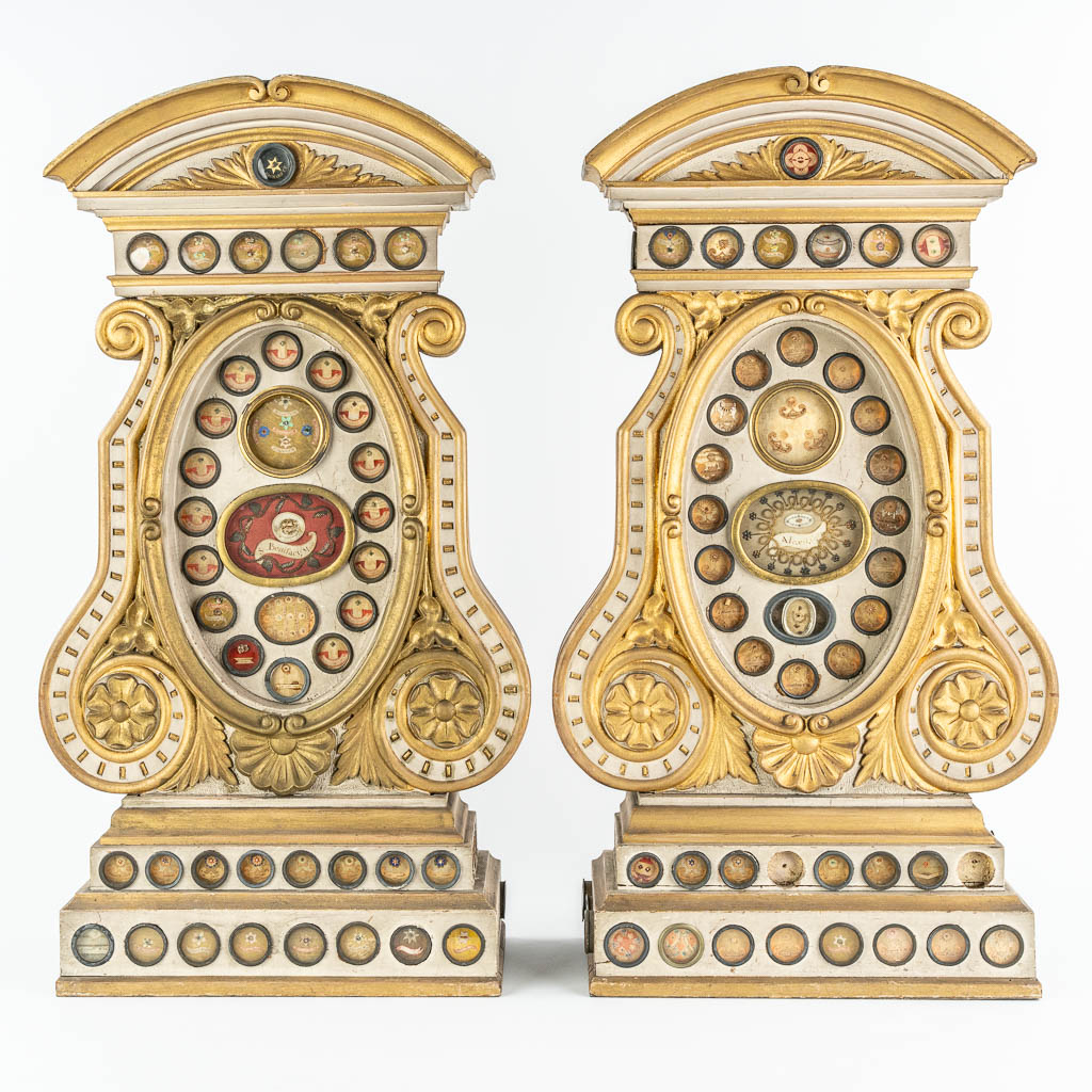 A pair of large reliquary cabinets with 95 theca, of which 65 have documents. Neoclassical style, 19th C.