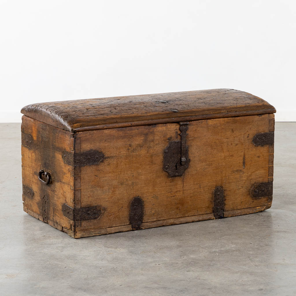 An antique chest with wrought iron hardware, circa 1700. (L:52 x W:93 x H:48 cm)