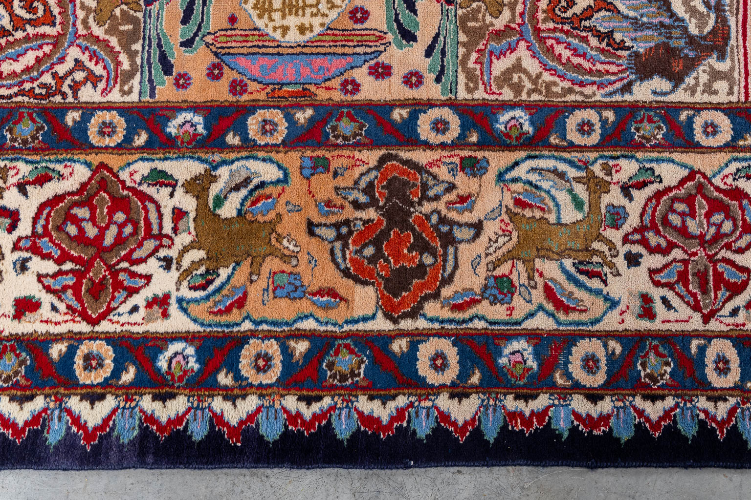 An Oriental hand-made carpet, Kashmar. (L:372 x W:305 cm)