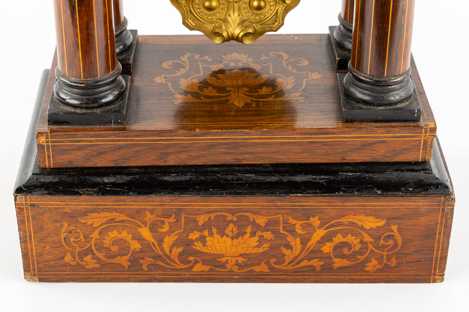 A column clock, marquetry inlay and gilt bronze. 19th C. (L:15 x W:25 x H:46 cm)