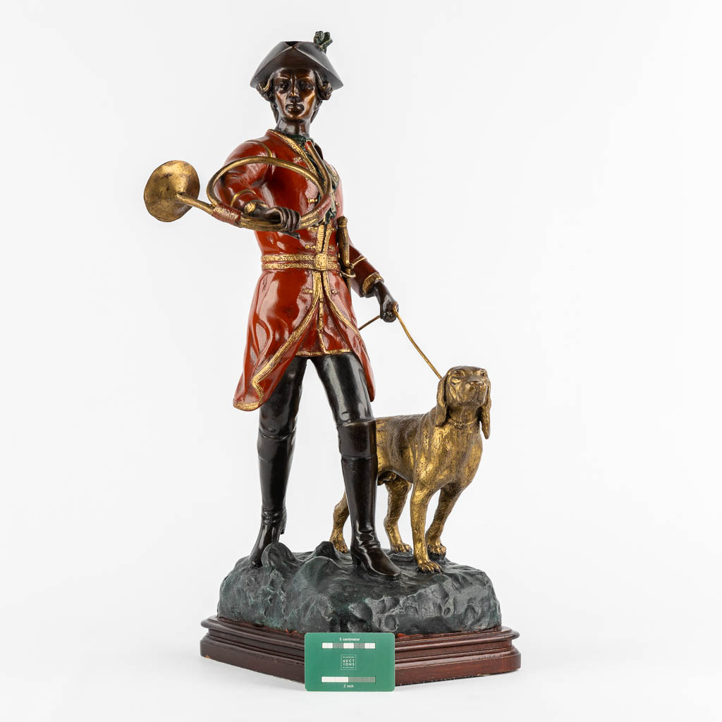 After Pierre Jules Mène, Hunter with his horn and dog. Patinated bronze. (L:29 x W:35 x H:62 cm)