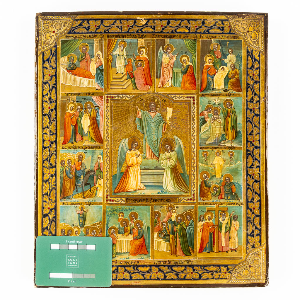 A Russian Feast Day Icon, 12 Orthodox feasts and Jeus Christ with angels, Faux Enamel. 19th C. (W:26,5 x H:31 cm)