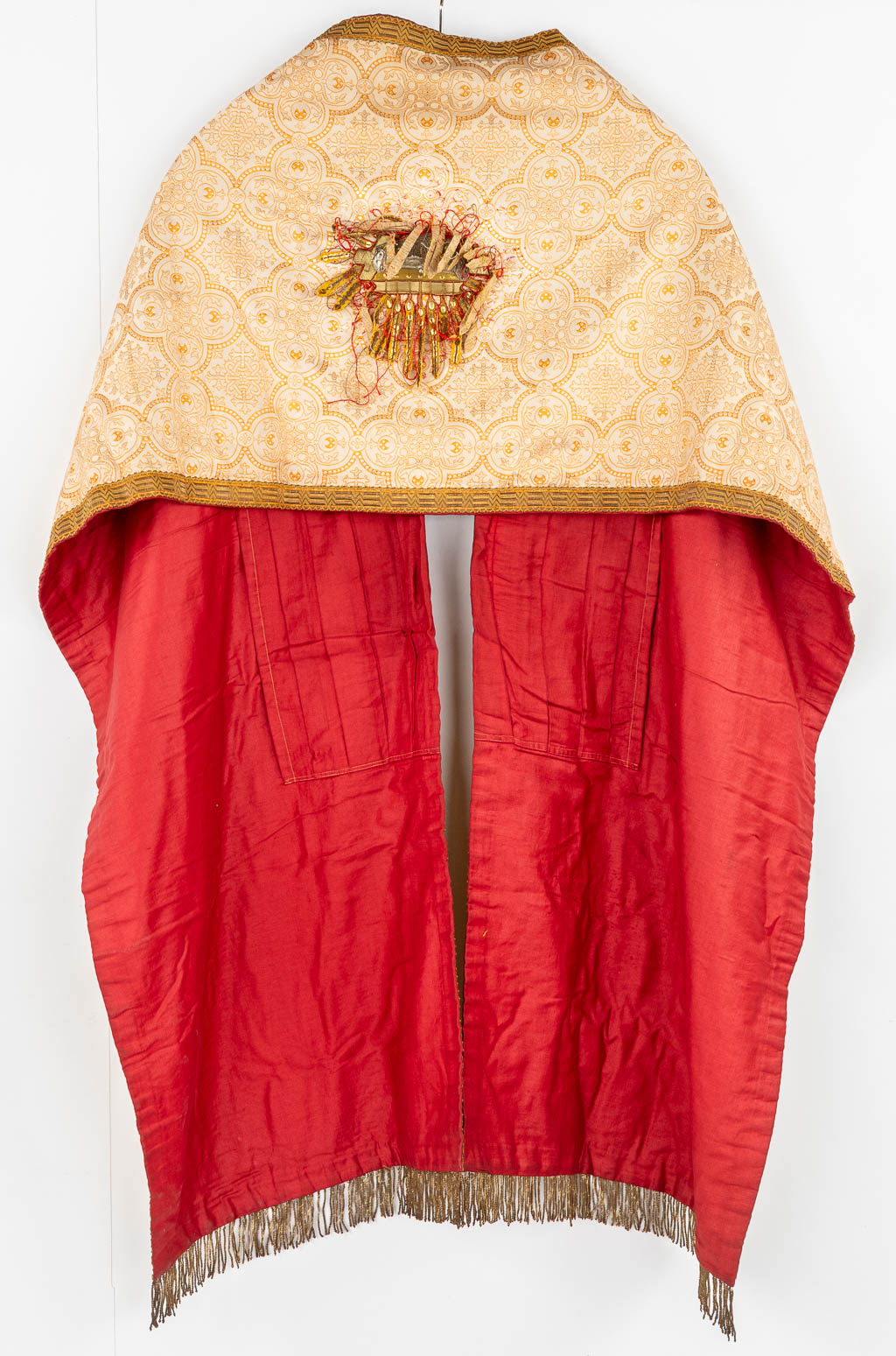 Three Roman Chasubles, Two stola, two pillows and a Humeral Veil. Thick gold thread embroideries.