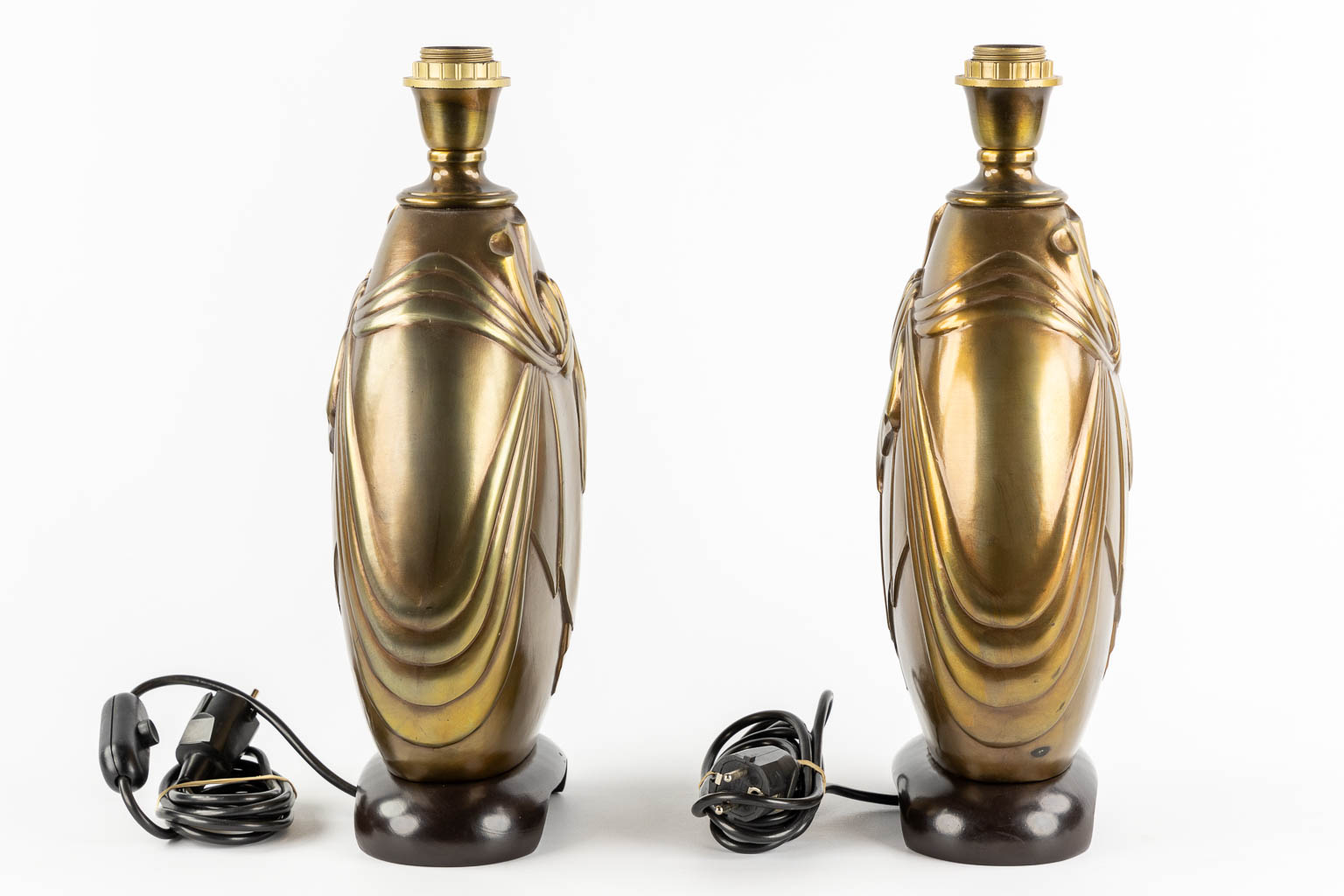 Deknudt, a pair of table lamps. Hollywood Regency style. (L:13 x W:23 x H:43 cm)