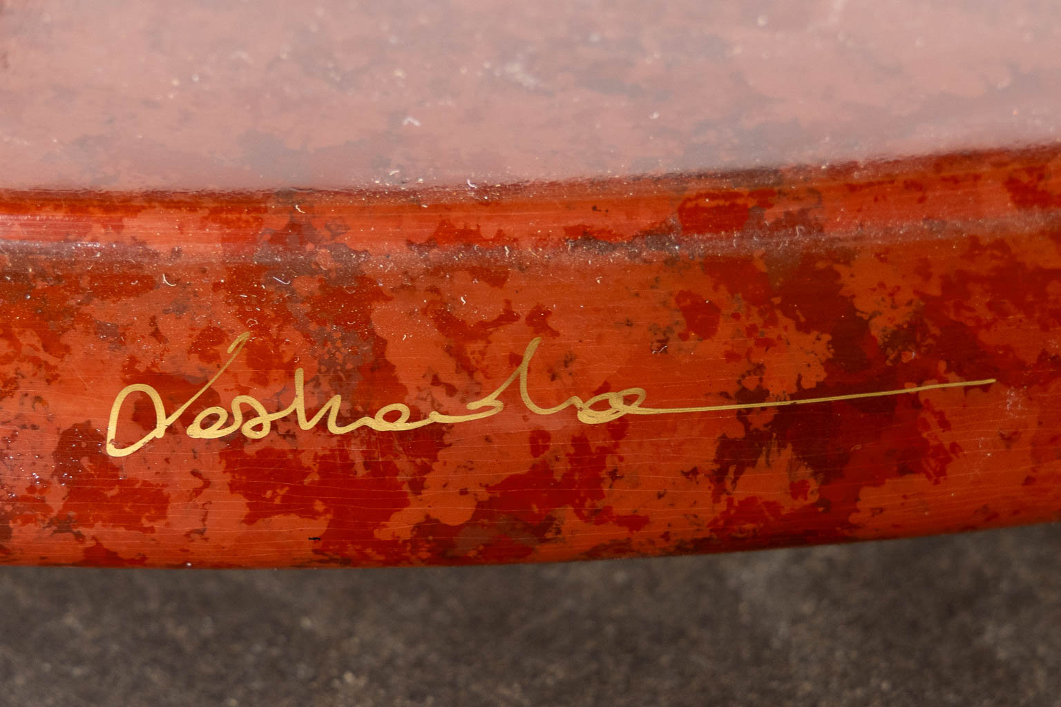 A decorative table with 'Cranes' decor, on a Louis XVI style table base.